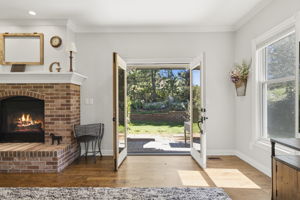 Picturesque french doors leading to the gorgeous brick paved back patio.