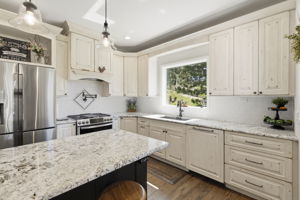 Timelessly remodeled kitchen with tons of natural light.