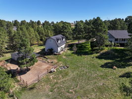 Equestrian lovers dream! 2 horse stall barn, complete with a covered roof, tack room, hay storage and a riding arena.