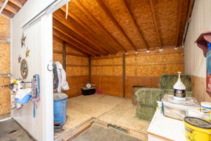 Equestrian lovers dream! 2 horse stall barn, complete with a covered roof, tack room, hay storage and a riding arena.