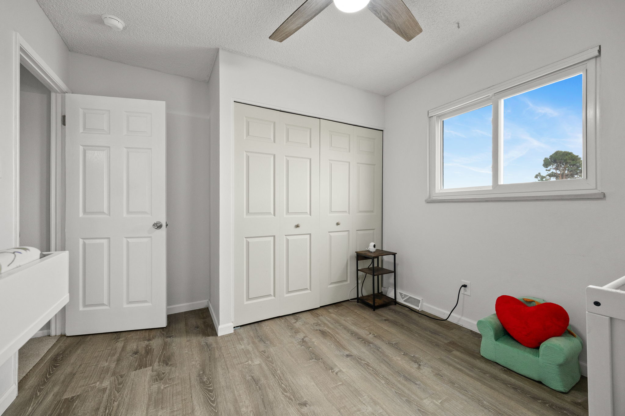 1 of 2 junior bedrooms on upper level