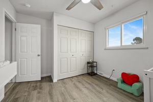 1 of 2 junior bedrooms on upper level