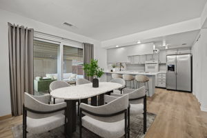 Kitchen & dining flow to covered patio