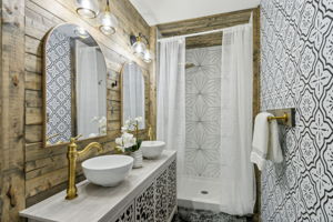 ... and a beautifully tiled shower.