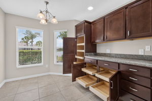 Kitchen and Dinette with Roll-Out Shelving and Dinette