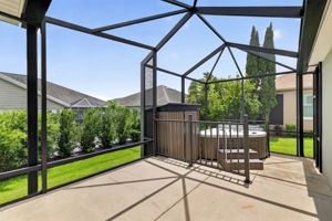 Extended Birdcage with Hot Tub, Storage Shed, and PRIVACY Landscaping!