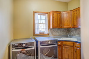 Laundry Room with Tile Backslash