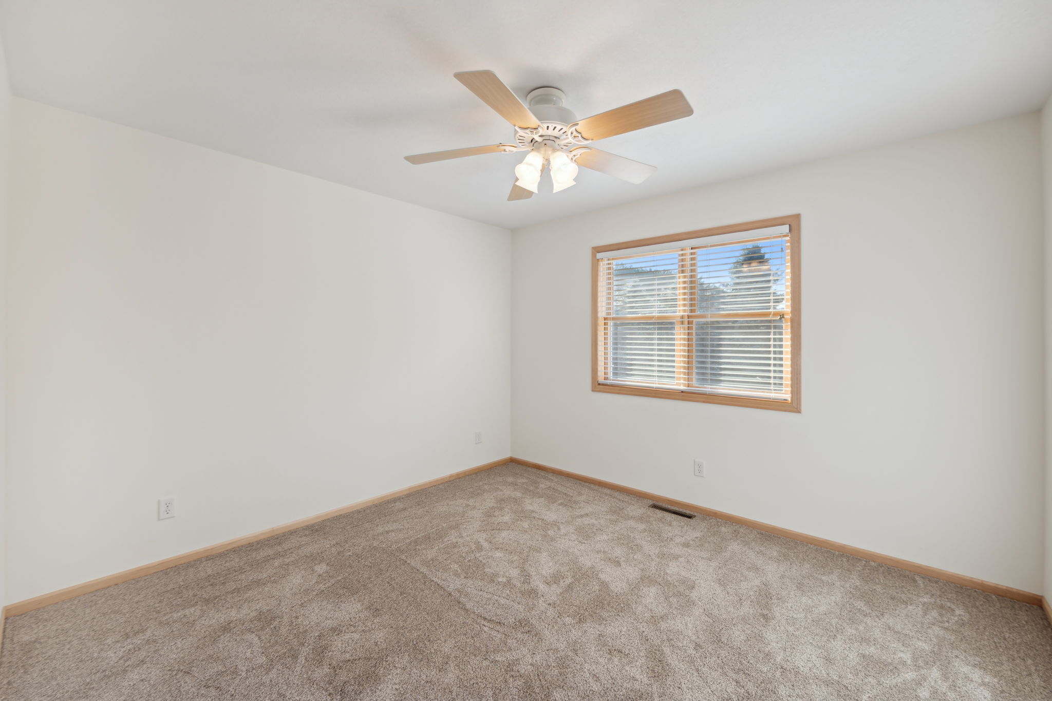 The lower level offers 3 additional large bedrooms