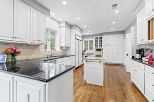 Kitchen with Warming Drawer and Wall Oven
