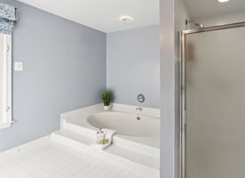 Primary Bathroom with Soaking Tub & Separate Shower