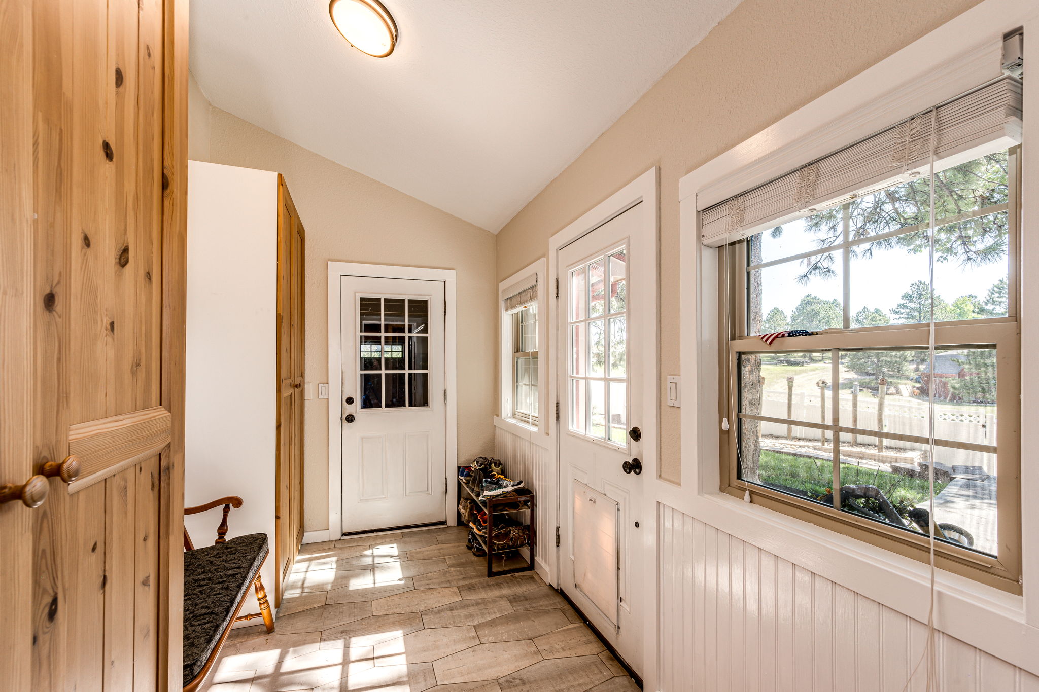 Remodeled Mud Room w Storage & Garage Access