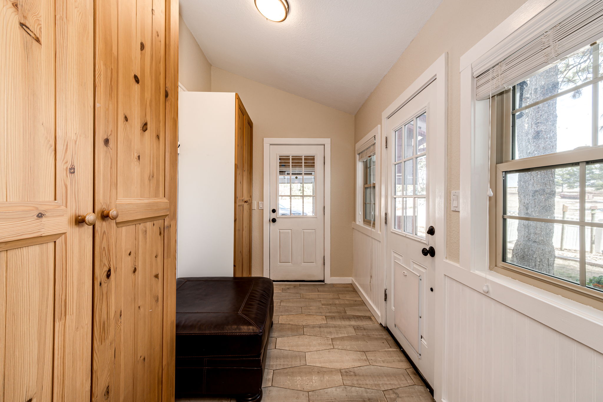 Remodeled Mud Room w Storage & Garage Access