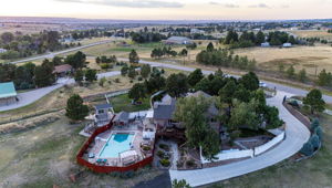 Fenced Back Yard w Concrete Drive