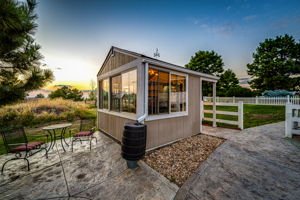 Greenhouse with Stamped Concrete Patios