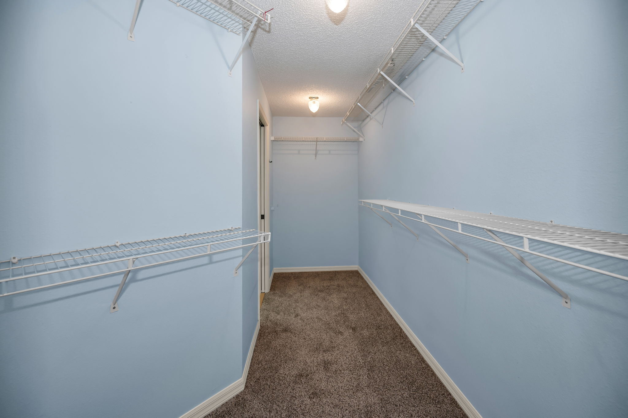 Primary Bedroom Walk-in Closet1a