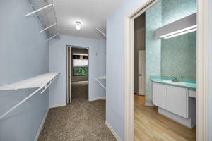 Primary Bedroom Walk-in Closet1b