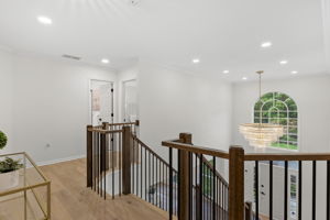 Upper Hall Overlooking Foyer with Custom Chandelier