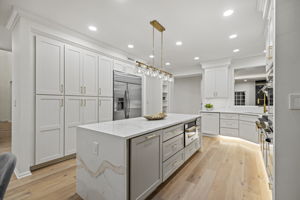 Kitchen w/ Quartz Center Island and High-End Appliances