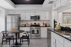 Kitchen virtually renovated and staged for inspiration.