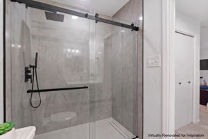 Walk-in shower virtually renovated for inspiration.