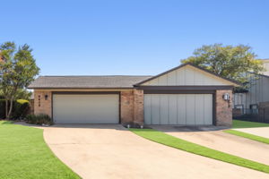 A nice wide driveway leads up to your two car garage. 9419's garage is the one on the left.