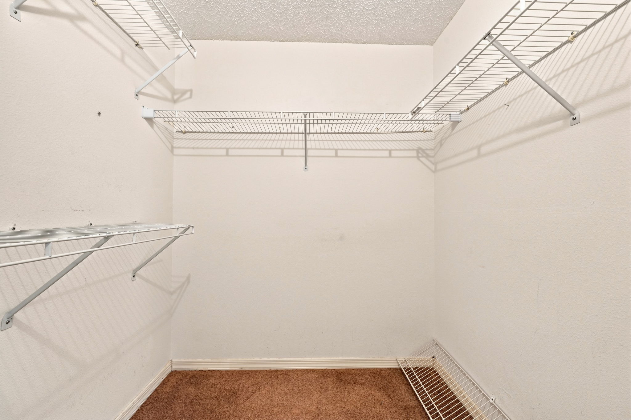 Primary Bedroom Walk-in Closet1