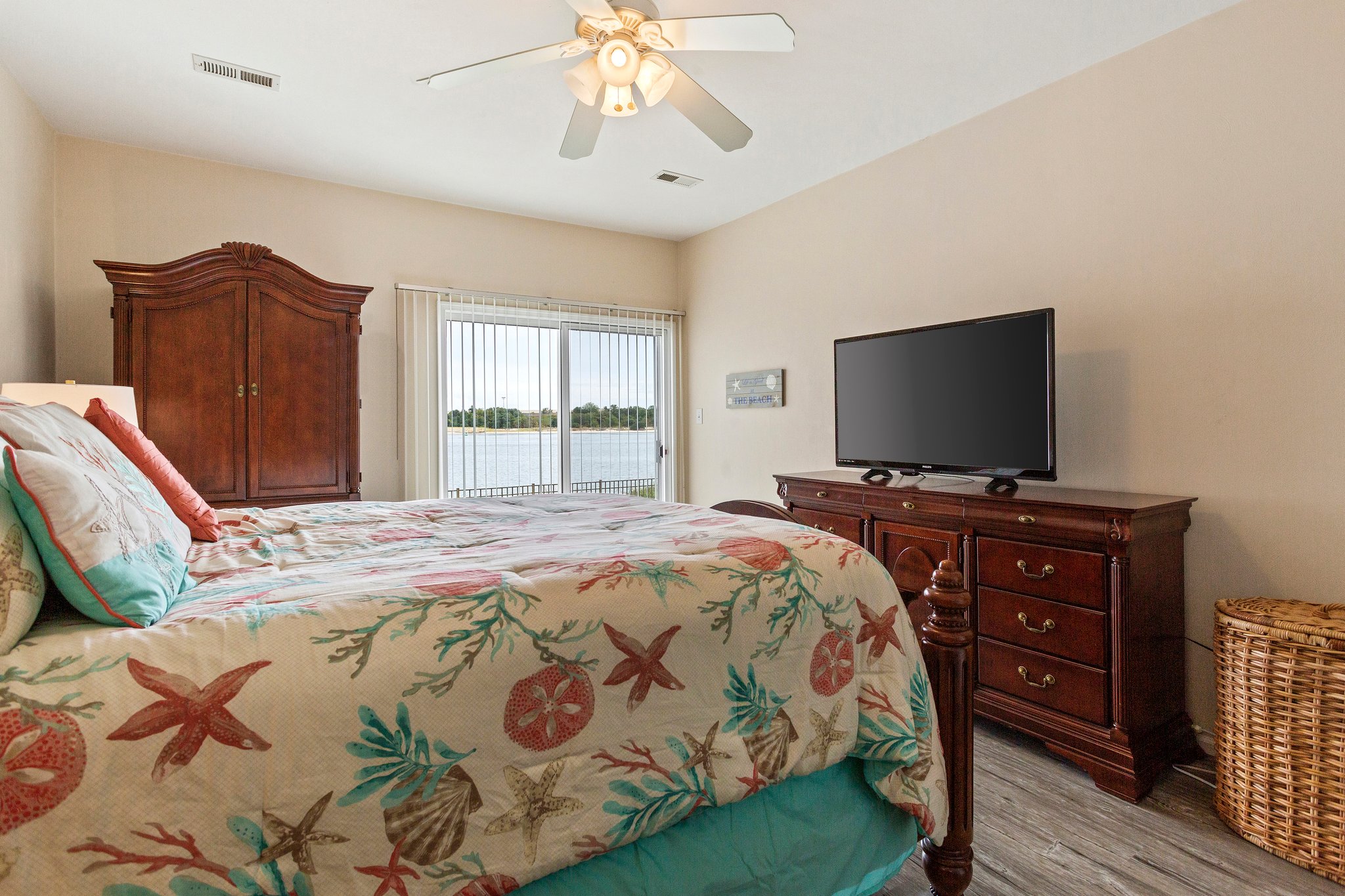 Primary Bedroom with access to patio and bay views