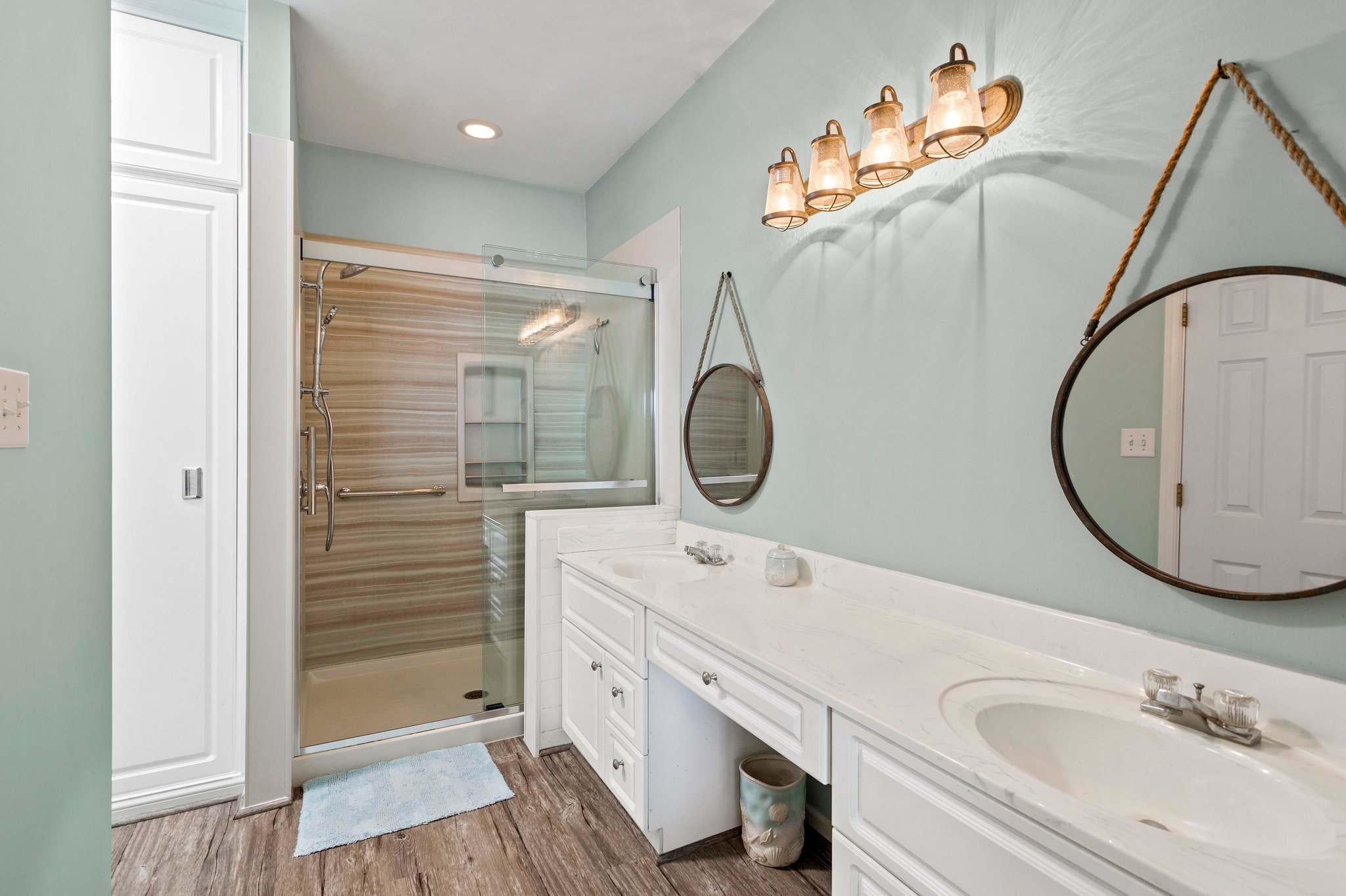 Updated Primary Bathroom with expansive walk-in closet