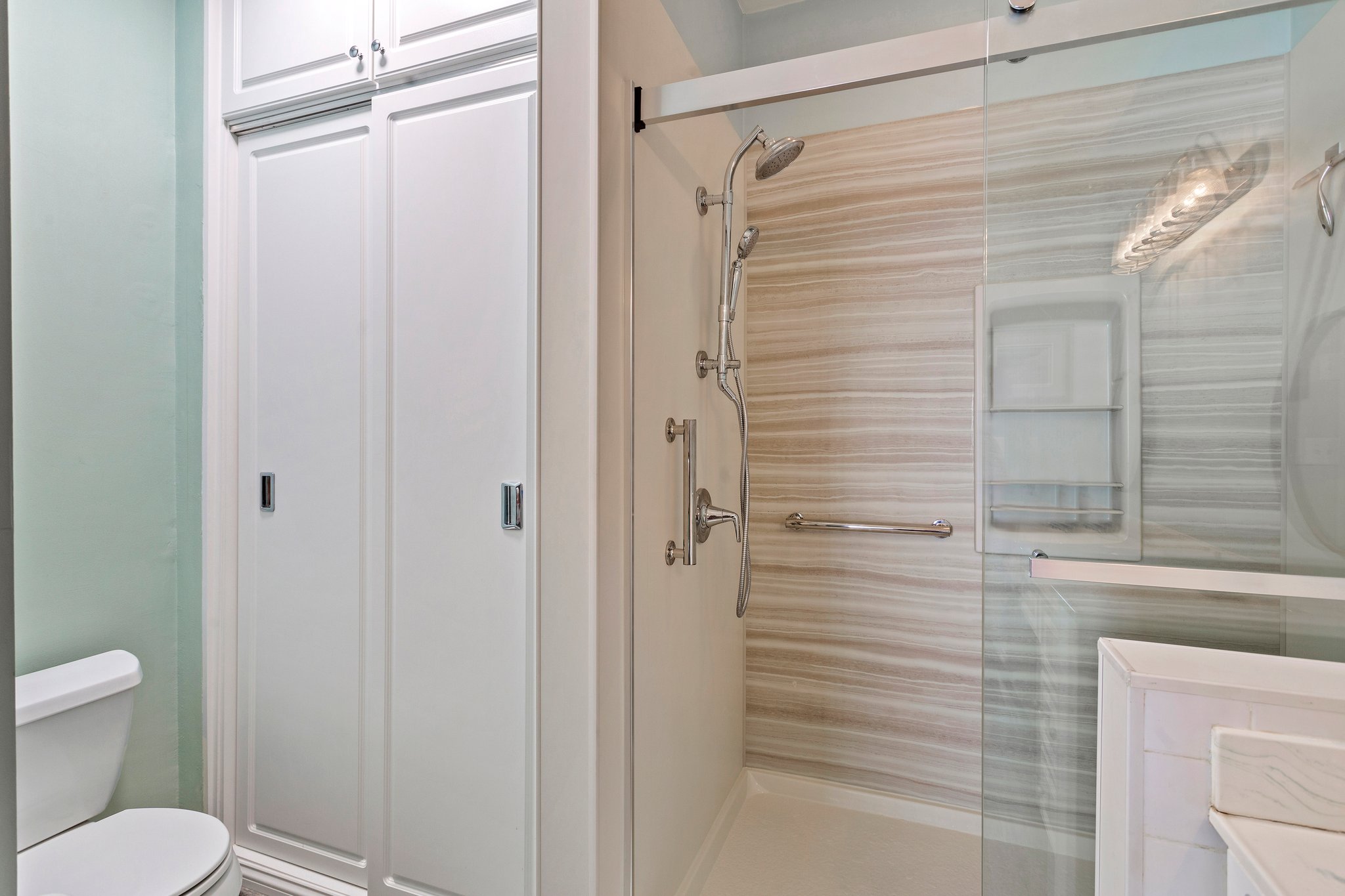 Large shower & custom built-in storage