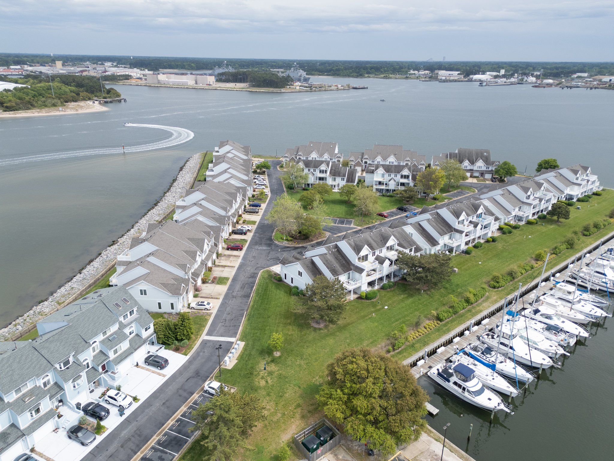 Aerial photo captures the marina and breathtaking water views, emphasizing the beautiful surroundings