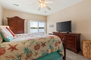 Primary Bedroom with access to patio and bay views