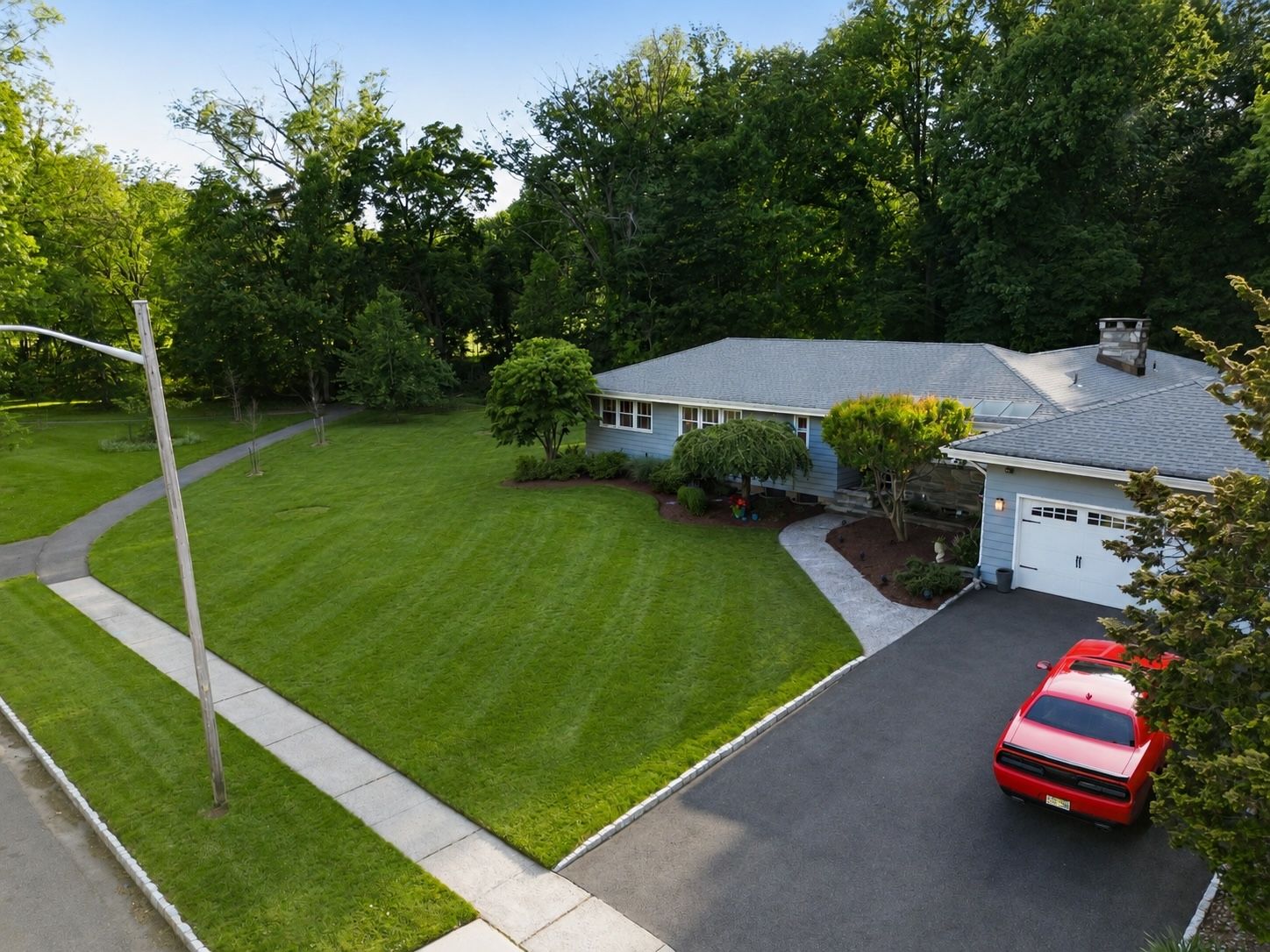 From the street, 95 Yantacaw Brook Road is charming, understated, and welcoming. It's only when you step through the home and discover what lies beyond that the true magic of this property reveals itself.