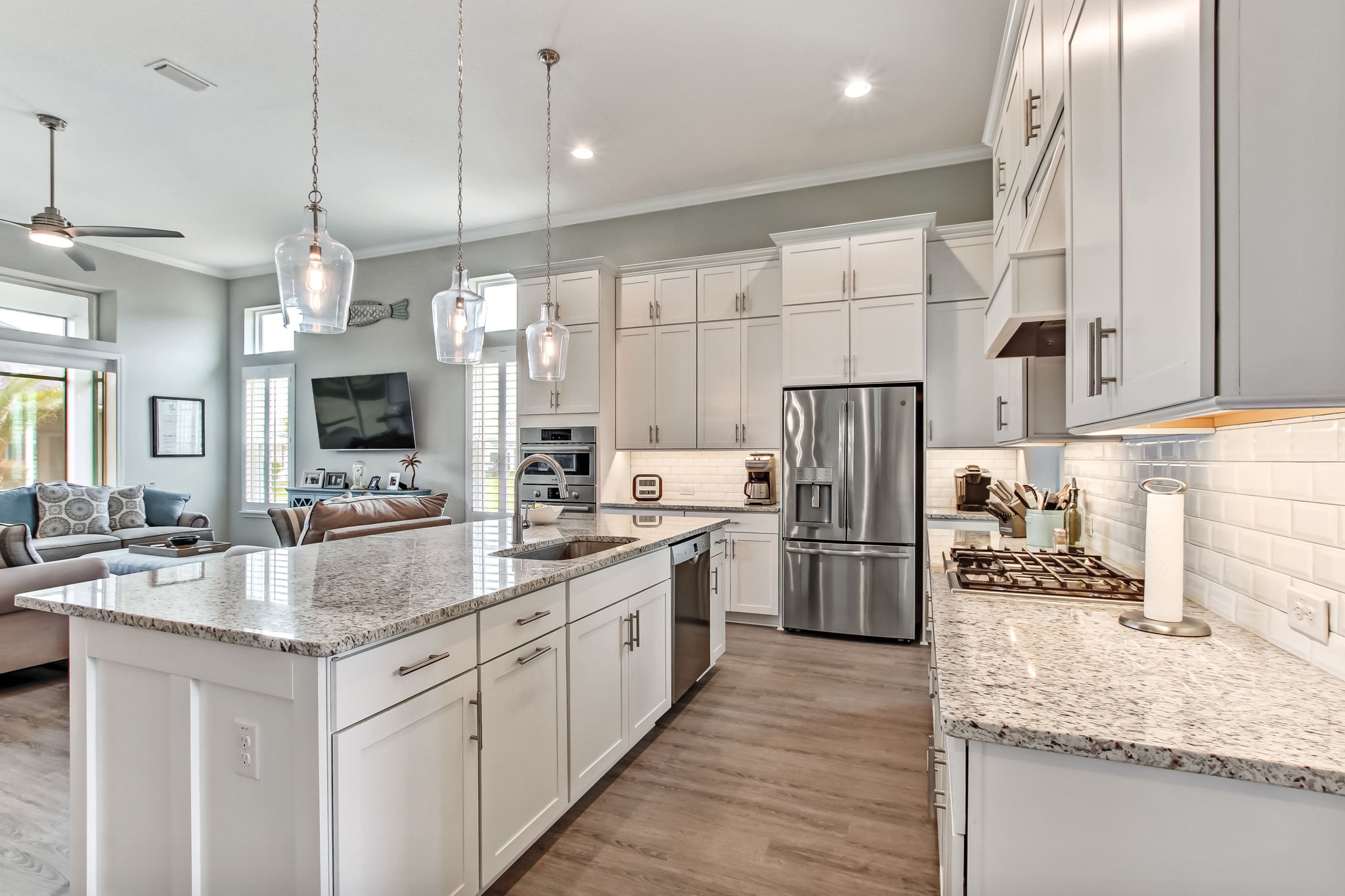 An elegant Chef's kitchen is complete with Bosch appliances.