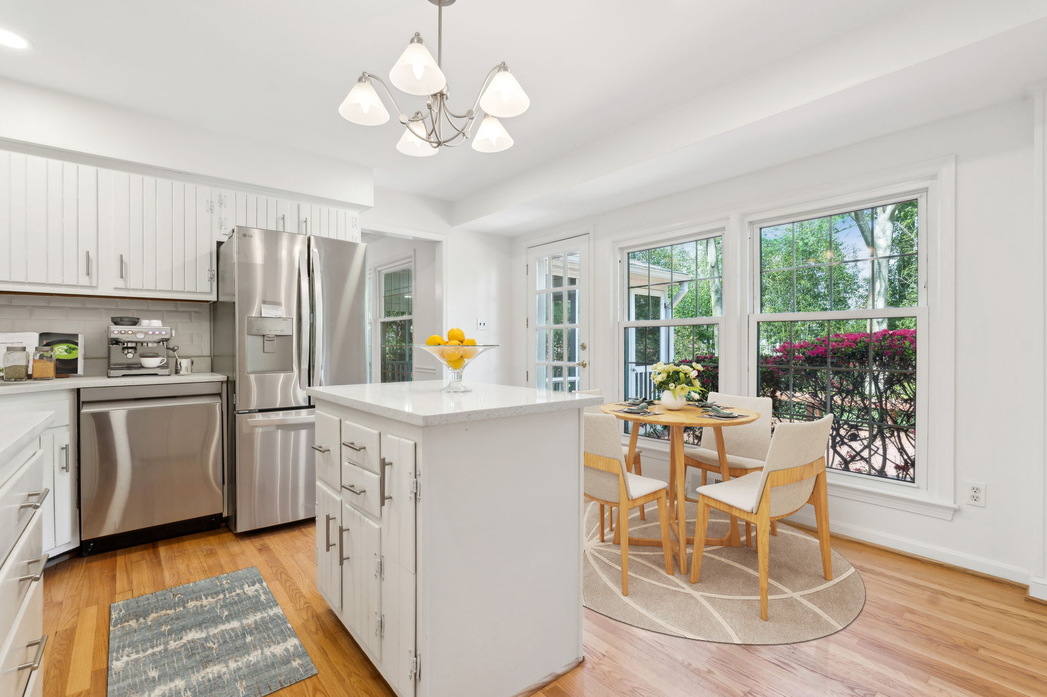 Breakfast nook overlooking deck (Virtually Staged)