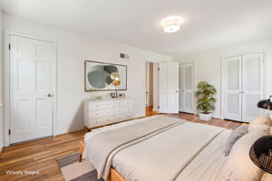 Primary bedroom w/ ensuite bath