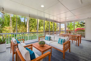 Cheerful Screened-in Porch (Virtually Staged)