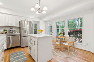 Breakfast nook overlooking deck (Virtually Staged)