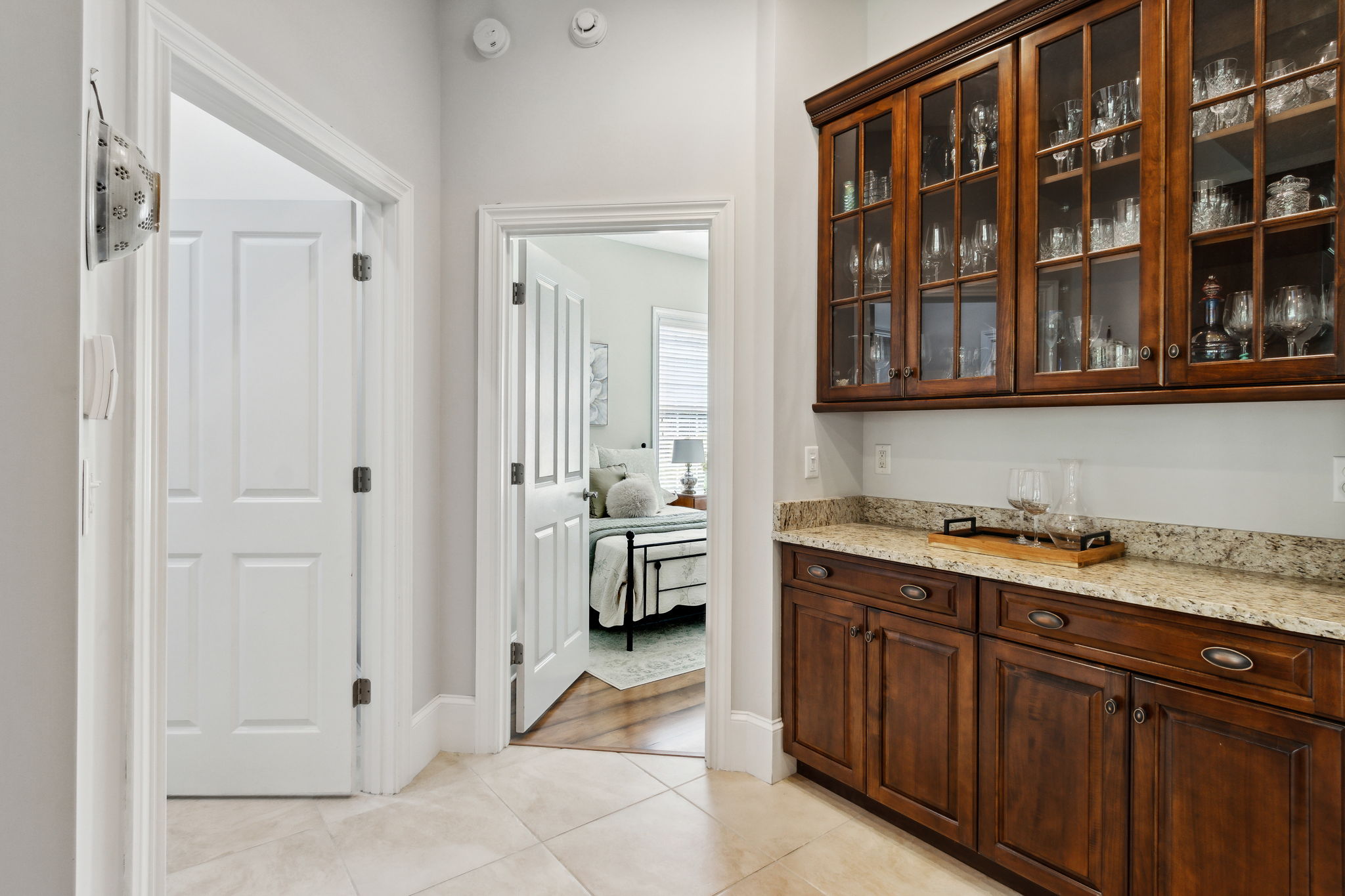 Off the kitchen, enjoy the additional storage and workspace of a butlers pantry