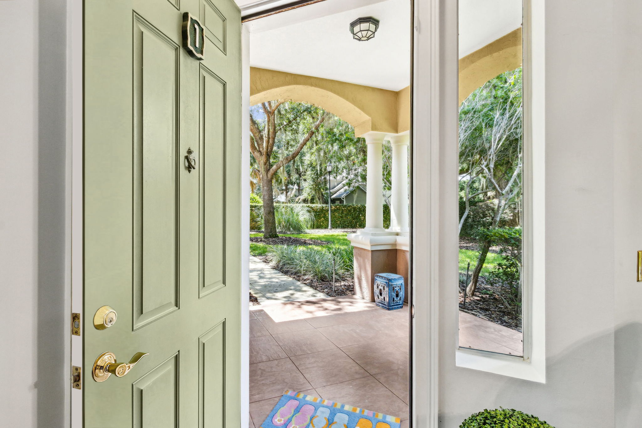 Step into the villa through a welcoming 10’ x 10’ covered front porch ...