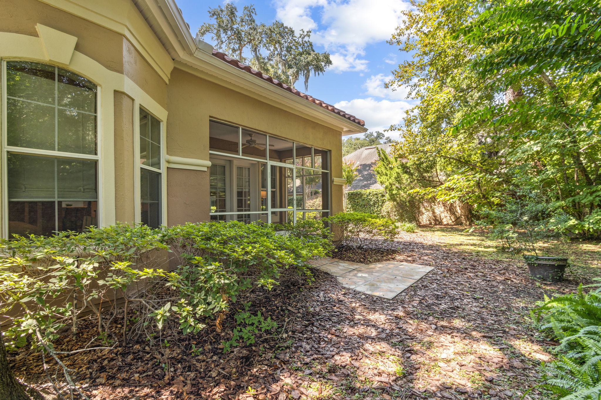 ... and an expansive side yard that feels like your own private outdoor space.