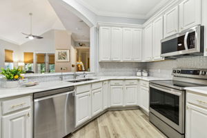 ... blend beautifully with the grey-and-white marble backsplash.