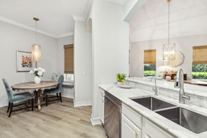 The kitchen also features newer appliances, fixtures and instant hot water