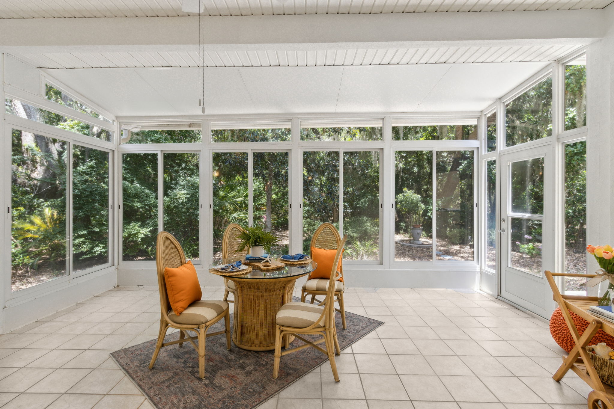 Sun Porch with sliding windows and access to patio