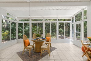 Sun Porch with sliding windows and access to patio