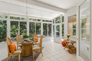 Sun Porch with sliding windows and access to patio