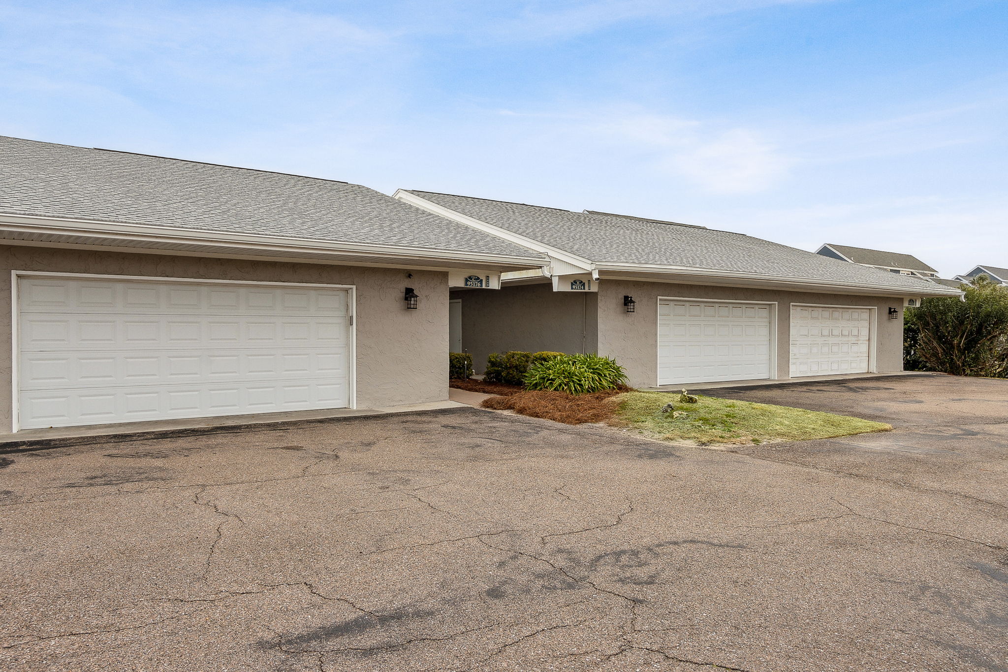 2 car garage and entrance to courtyard