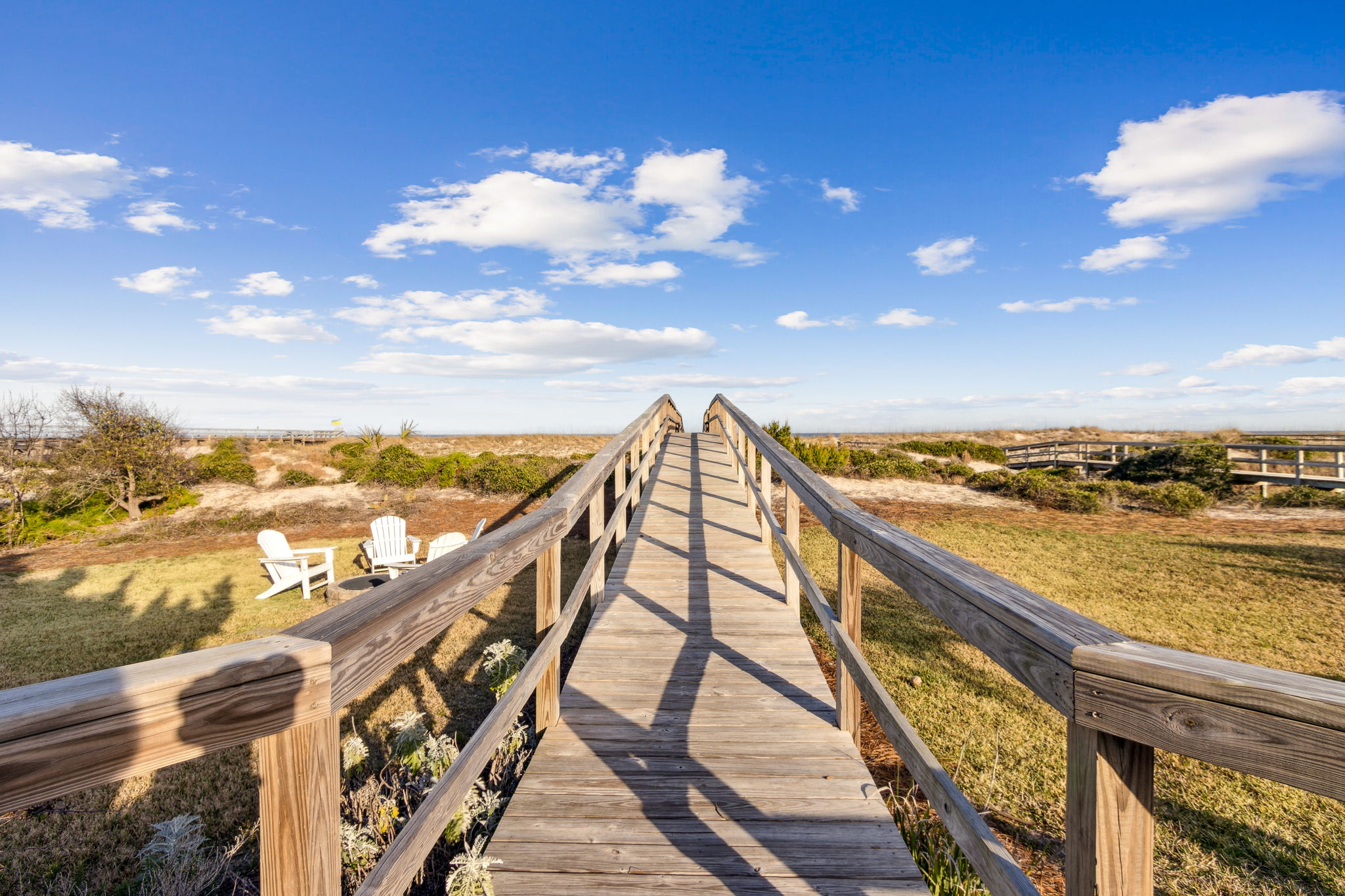 boardwalk to ocean and yard to play