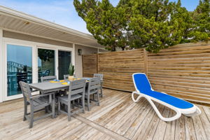 Oceanside deck with entrance to primary bedroom