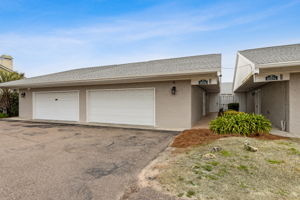 2 car garage  and entrance to courtyard