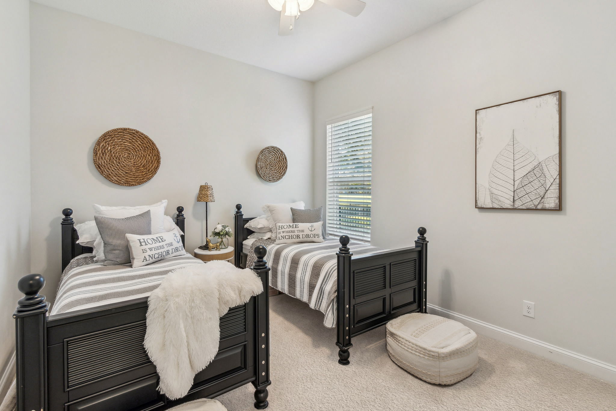 The 4th guest bedroom: all bedrooms are appointed with plush natural-toned carpeting.